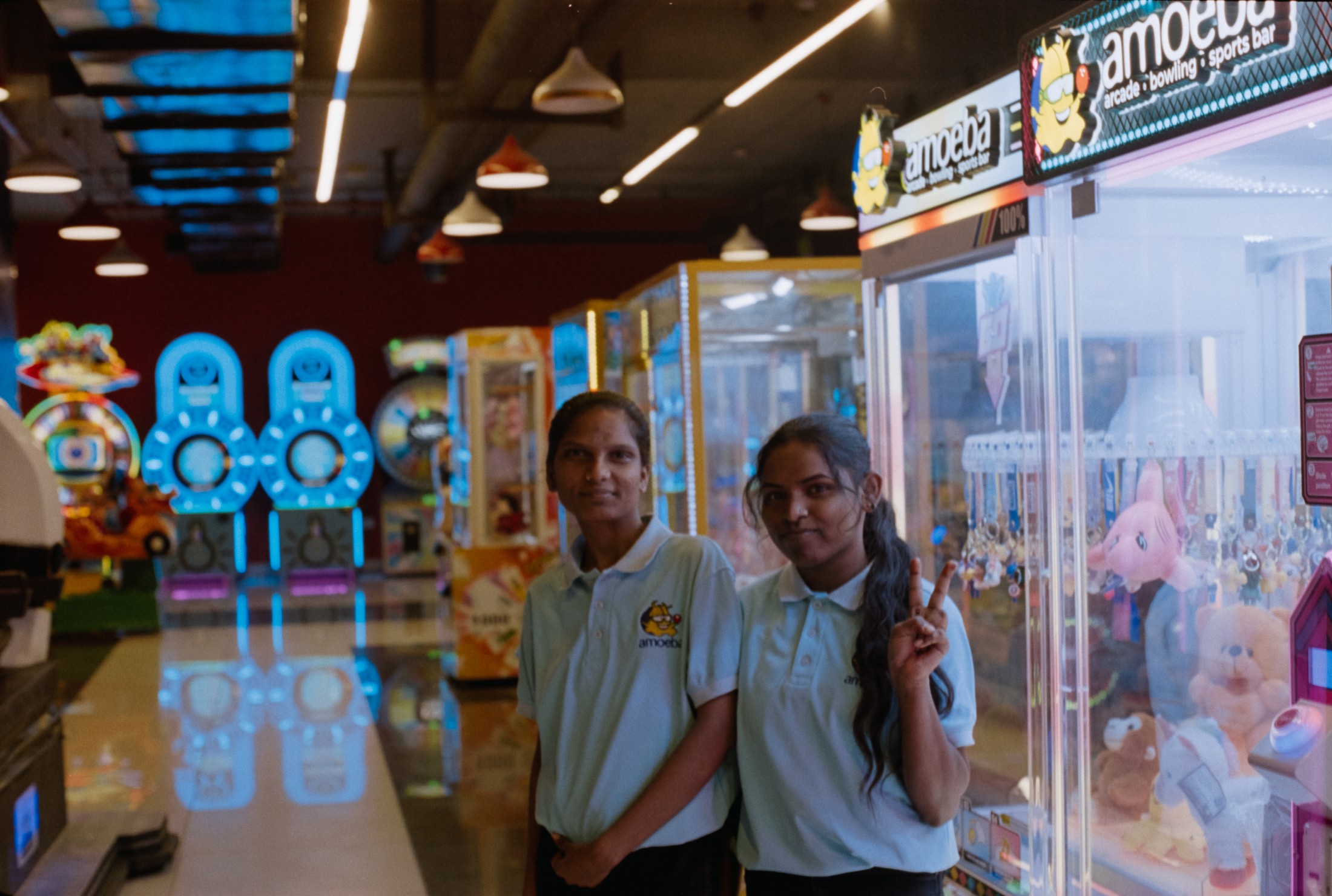 Arcade Workers in Atrium Mall
